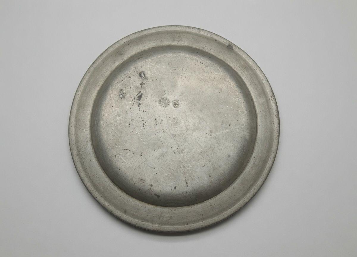 Reverse of the Utin plate with touchmarks and owner initials CK